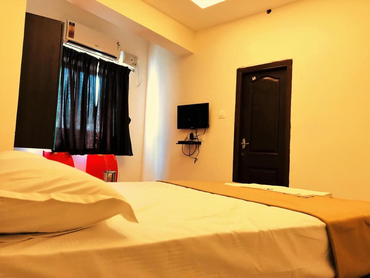 Cosmo Lodge Mangalore Exteriör bild
